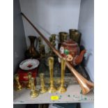 Metalware to include six sets of various brass candlestick holders, a copper coaching horn, brass