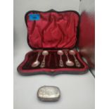 An incomplete set of silver spoons and an early 20th century silver vesta case. Birmingham 1901,