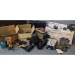 A mixed lot of photographic equipment to include a Hoya HMC Zoom lens and others, flashes, a