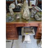 A group of weathered concrete garden ornaments to include a bird bath with square detachable bowl,