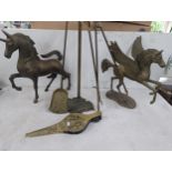 A brass model of a Pegasus 40cm high, a similar model of a Unicorn, along with fireside implements