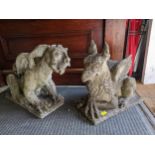 A weathered garden concrete model of a Griffin, resting on a rectangular plinth base, along with a