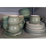 Mixed stoneware to include Denby Regency green cups and saucers and other items, along with