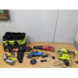 A group of power tools to include a Ryobi 18-volt angle grinder with accessories, in a bag, an