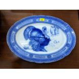 A Royal Doulton blue and white Turkey platter c1900, of oval form, decorated with a turkey in a