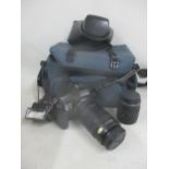 A Canon E05 camera with bag and accessories Location: