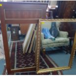 A Stag mirror and a late 20th century gold painted, framed mirror Location: A2B