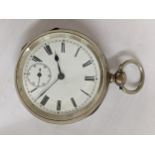 A late 19th century 935 silver open faced pocket watch having a white enamel dial and black Roman