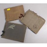 Three photograph albums containing scenes of English towns and cities from 1930s,another with from