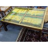 A vintage coffee table having a painted top depicting sailing ships 44.5cm h x 111cm w Location: