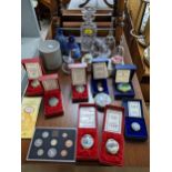 A mixed lot to include a collection of Halcyon Days and House of Troy enamel pill boxes, boxed