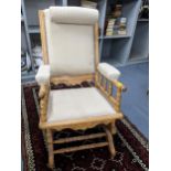 Late 19th/early 20th century wooden framed American rocking chair, upholstered seat, back and