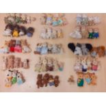 Circa 2000, a quantity of approximately 70 Sylvanian Families animal models and accessories