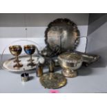 A selection of silver plated items to include a rose bowl, fruit basket, trays, and a teapot