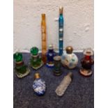 A group of Victorian and later glass scent bottles to include 2 green and clear glass examples