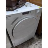 A Miele Novotronic T7644C dryer, together with a Stag mirror and a late 20th century gold painted,