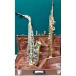 A cased Yamaha Alto saxophone A/F with inscription 'Altwood School' together with a Jupiter gold