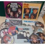 A quantity of Beatles LP's together with a quantity of 45rpm picture discs Location: 1:1
