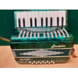 A small vintage Barera Venezia accordion in green with case. Location: RWM