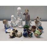 A mixed lot to include Beswick cats, Nao figures, and Toby jugs Location: