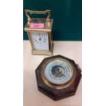 A Taylor & Bligh 5 window carriage clock together with an oak cased German barometer Location: