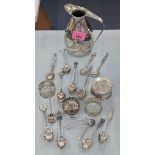 A small quantity of silver and white metal items to include a jug and collectors teaspoons Location: