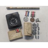 A mixed lot to include a Goliath pocket watch in a travel case A/F, Bucks Constabulary badges and
