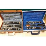 A cased Boosey & Hawkes clarinet A/F together with a cased Selmer clarinet Condition: The push-in