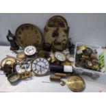 A selection of clock parts to include longcase clock dials, movements, dials, weights and other