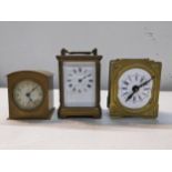 Three clocks to include an early 20th century alarm carriage clock Location: