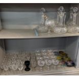 Mixed glassware to include various crystal cut glass decanters, glasses to include Champaign saucers