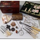 A mixed lot to include an early 20th Century fitted manicure set, a bakelite cigarette case, a white