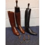 A pair of vintage brown leather riding boots (11" toe to heel and 4" at widest point of soles)