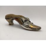 A late Victorian silver pin cushion in the form of a shoe, 33.5g Location:
