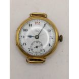 An early 20th century 9ct gold wristwatch, the white enamel dial inscribed Reid and fitted with a