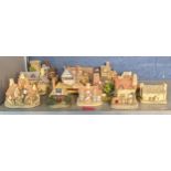 A mixed lot of collectibles to include Lilliput Lane cottages and other buildings, a large