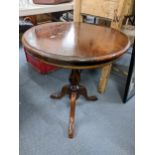 A reproduction Georgian inspired circular topped occasional table on three splayed legs, 66cm h x