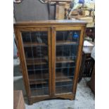 An Edwardian mahogany side cabinet with string inlay and extend back, long twin cupboard doors on