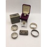 Mixed silver and white metal to include two silver napkin rings and trinket boxes, and others, along