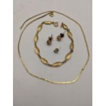 A 14ct gold necklace 3.9g together with three yellow metal earrings 1.3g and a gold plated