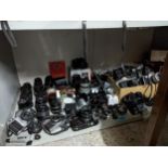 A selection of 35mm film cameras, and various digital cameras, lens and accessories to include