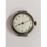 An early 20th century silver cased trench watch Location: