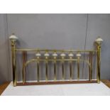 A late 20th century brass and ceramic headboard Location: