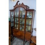 Late Victorian inlaid breakfast mahogany display cabinet, broken swan neck pediment above twin