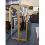 A pair of modern oak framed cheval mirrors, approx 150cm Location: