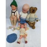 Dolls and a teddy bear to include an early 20th century German bear and doll Location: