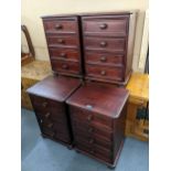 A set of four stained pine bedside chests of drawers on bun shaped feet, 68cm h x 46cm w Location: