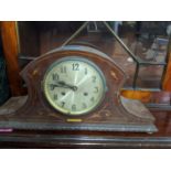 an Edwardian inlaid mahogany Napoleon Hat mantel clock Location: