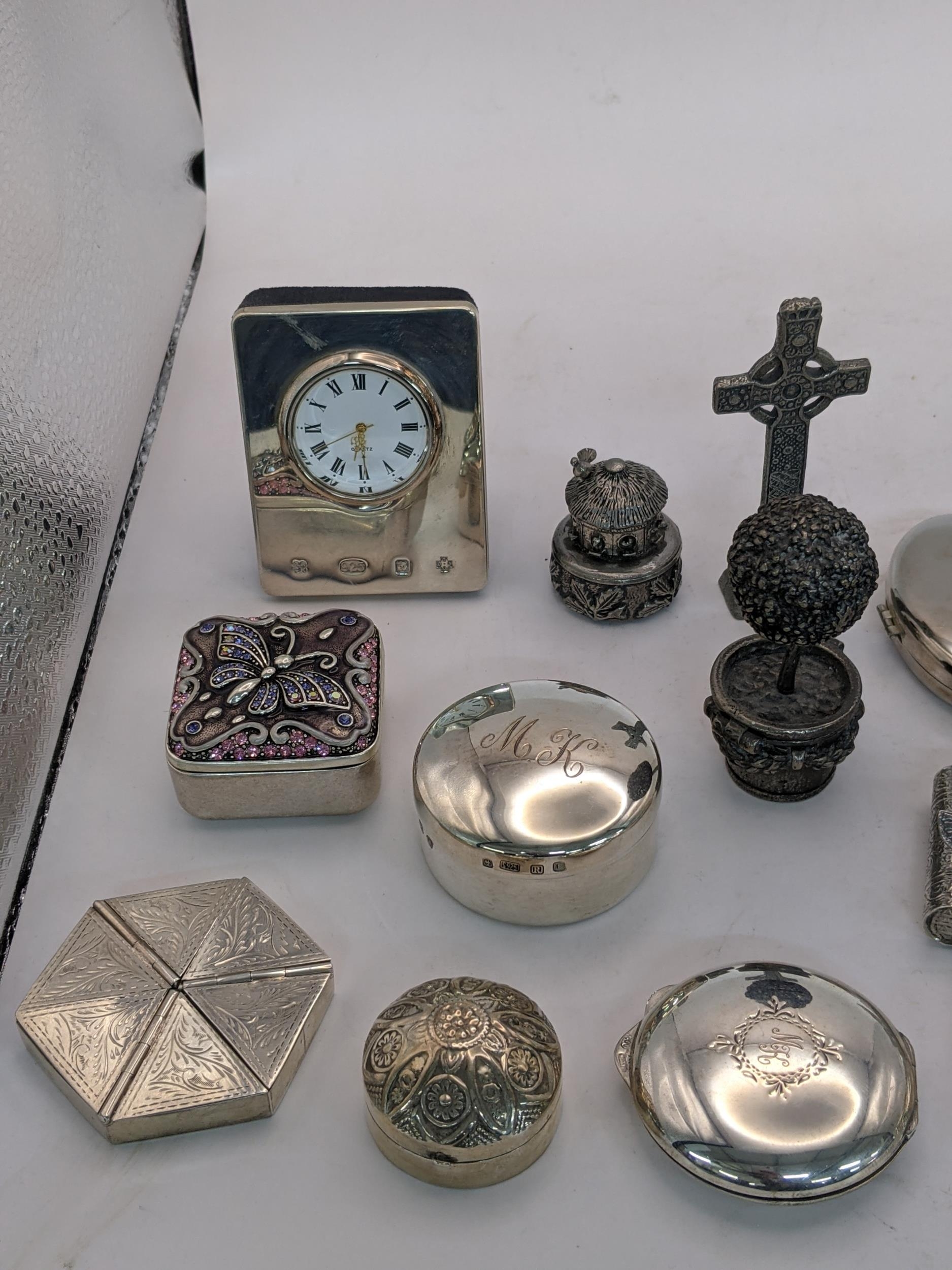 A collection of sterling silver and white metal pill boxes, also including a desk clock on an - Image 2 of 4