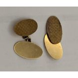 A pair of oval 9ct gold cufflinks, 8g Location: